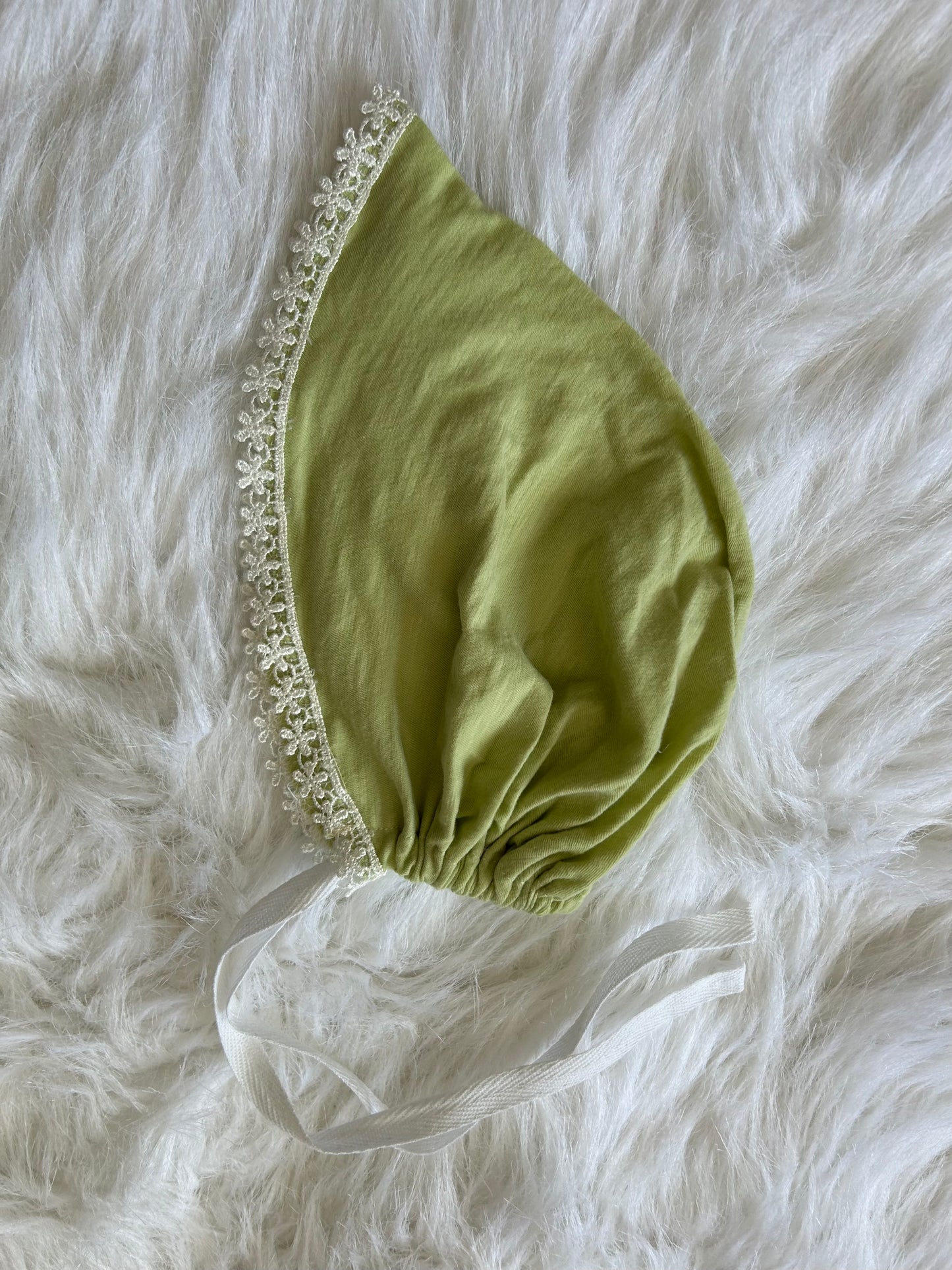 100% cotton lime green with floral trim.